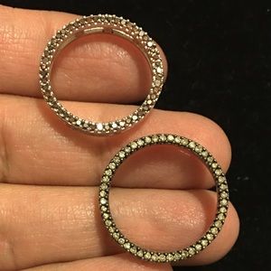Diamond sterling silver pendants.